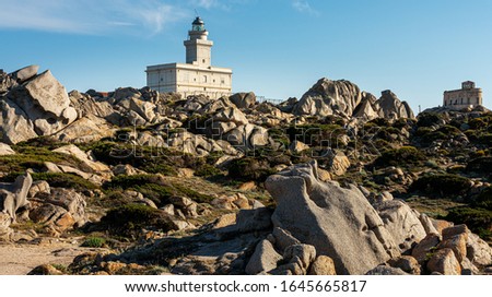 the lighthouse in the rocks of capo testa on the island of sardinia, italy