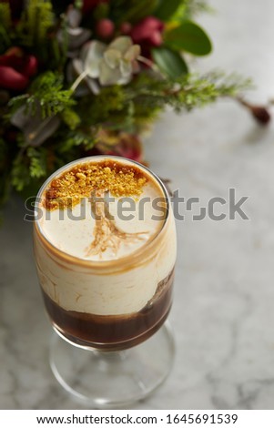 Coffee dessert, tree design on cream 