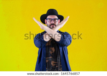bearded Guy making loser sign