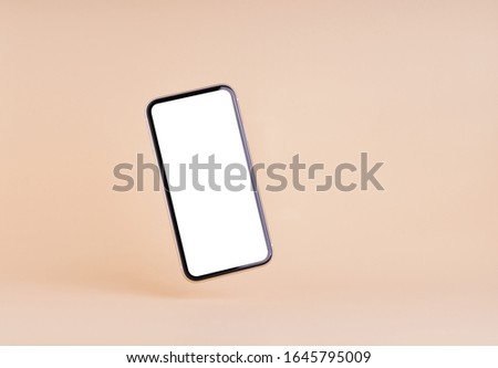 smart phone blank screen on cream color background
