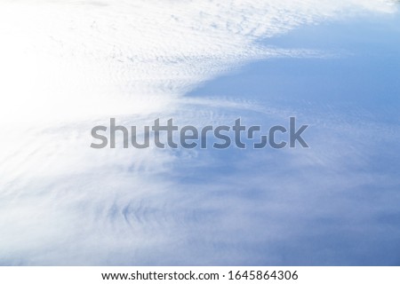 Sky with windy weather clouds scatered by harsh wind. Windy weather concept. Climate change background.