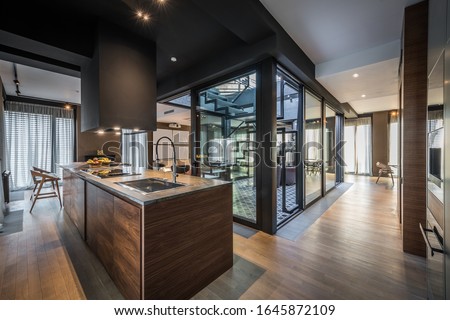 Kitchen interior in modern luxury penthouse apartment Royalty-Free Stock Photo #1645872109