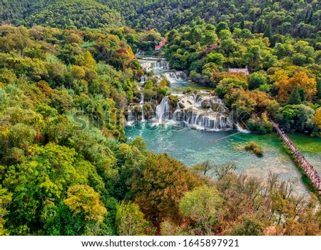 Aerial Photo of Krka waterfalls in the Krka National Park in Croatia. Green, yellow, blue and autumn colors.