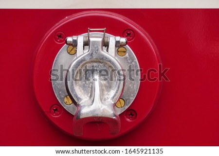external docking element of the red retro tram, Museum exhibit, mounting element, metal latch