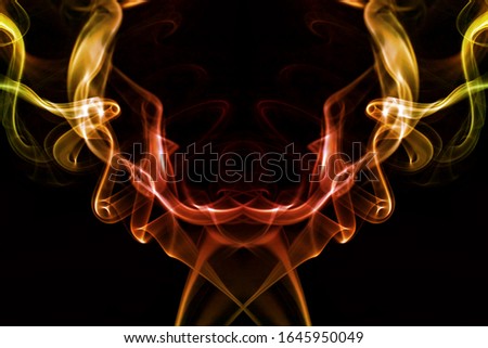 Smoke structures against a black background 