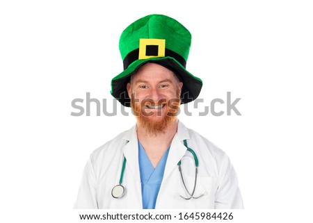 Redhead doctor with green hat looking at camera isolated on a white background