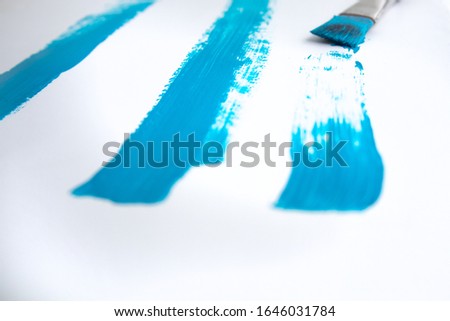 Brush that draws a blue line on a white background