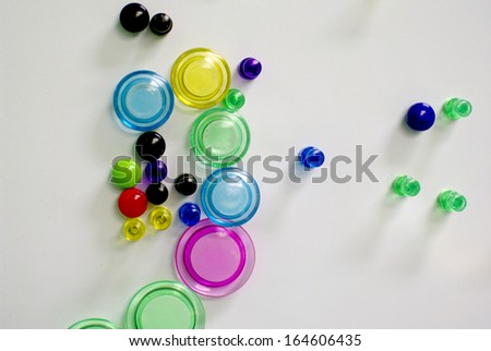 colorful magnet pins on magnet wall in office