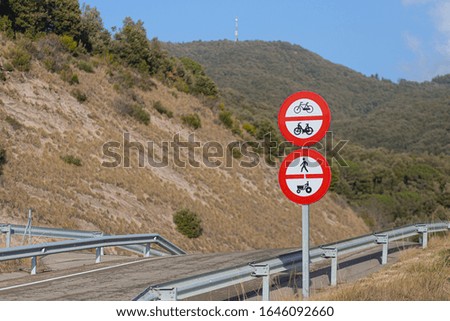 Forbidden vehicles signals on a highway entry