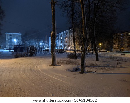 night illumination of a small and calm city in the winter season