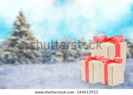 Christmas preset boxes on winter background