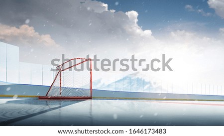 Red gate on an empty hockey rink. Hockey goal in the spotlight. Hockey Arena. Sports background. Hockey rink high in the mountains. Snowfall