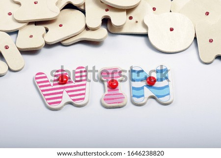 wooden letter that can make some words such as, win, love, mix 