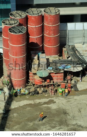 Big water tank in the construction worker camp in the city