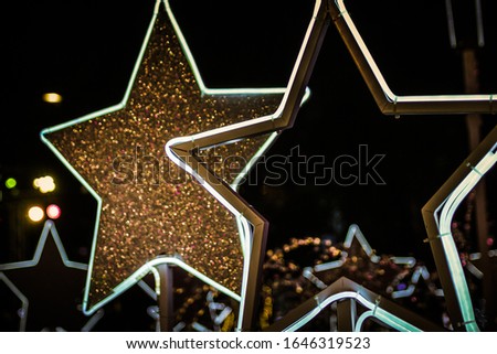 Star of light bulb neon signboard on transparent background.