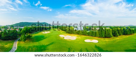 Aerial view of a beautiful green golf course in Shanghai,panoramic view.