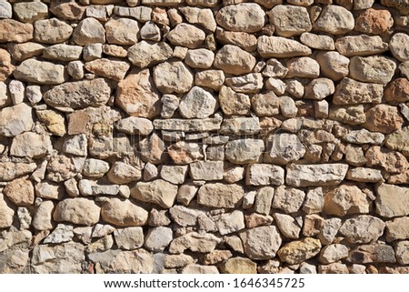 Stone wall background at high resolution