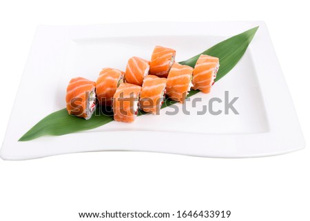 Set of roll philadelphia on a white plate. It is isolated in a white background. Close-up.