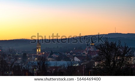 Sunset over the town of Telch, in the Czech Republic. Europe. Blue Hour. On the horizon, it boasts a television transmitter, Javořice.