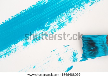 Brush that draws a blue line on a white background