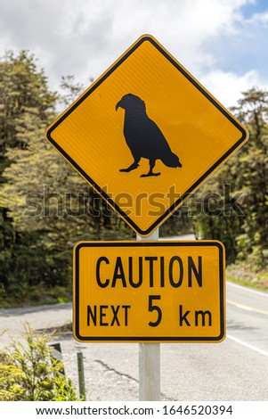 Warning sign for the Kea Birds, which frequently sit on the State Highway 73 at Arthur's Pass, Canterbury, New Zealand .