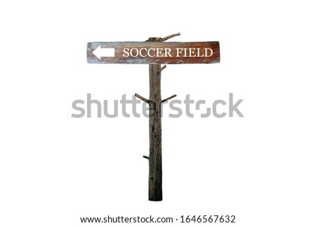 Wooden sign written on the way to soccer field isolated on white background with clipping path