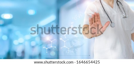 The doctor shows a stop gesture. DNA. Digital healthcare, modern virtual screen interface, medical technology and network concept.