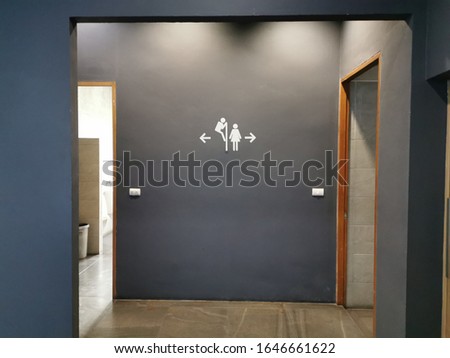 Bathroom entrance with men and women's toilet
