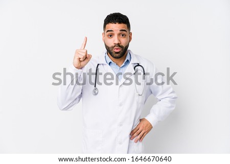 Young arabian doctor man isolated having some great idea, concept of creativity.
