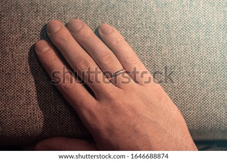 Close-up Hand of a Man with golden Ring, concept Picture about Family, Wedding, Divorce