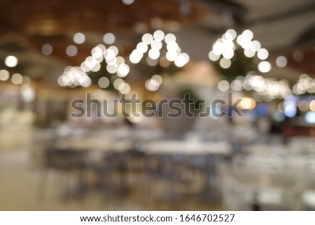 Blur image of canteen, use for background.Defocused or blurred photo of food court 