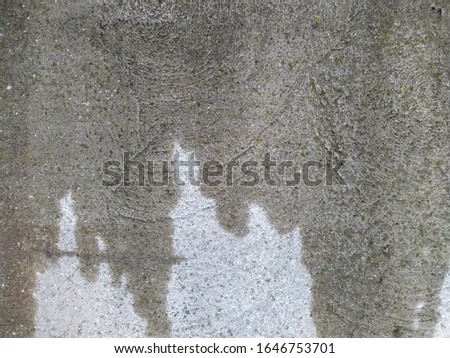 texture and background of old and wet concrete slab