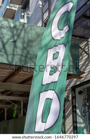 CBD Banner in Front of Shop