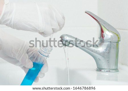 Tap water analysis quality control concept. Water test. Royalty-Free Stock Photo #1646786896