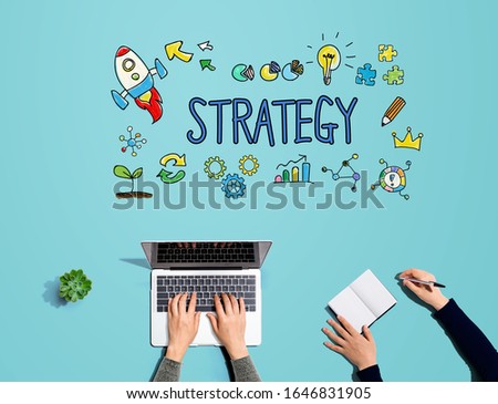 Strategy with people working together with laptop and notebook