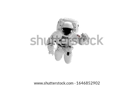 Flying astronaut on a white background. Some components of this image are provided courtesy of NASA, and have been found at nasaimages.org Royalty-Free Stock Photo #1646852902