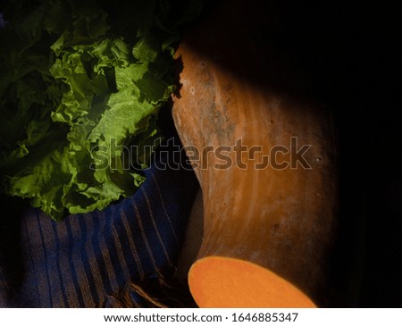 lettuce and pumpkin in the shadows