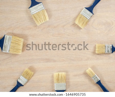 Painting equipment with some copy space; many paint brushes