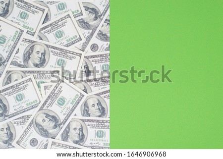 Photo of two parts of different background with seamless repeat paper us cash and bright green for design or text Royalty-Free Stock Photo #1646906968