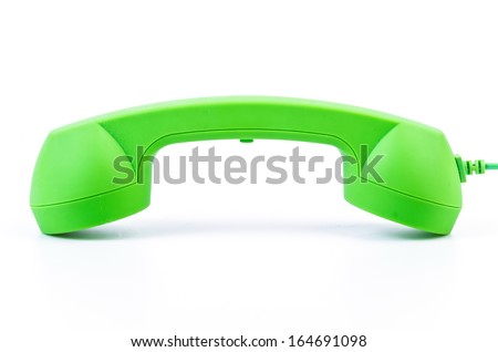 Green telephone on isolated white background