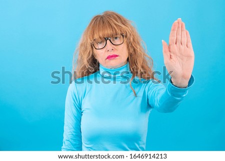 adult or senior woman isolated on color background