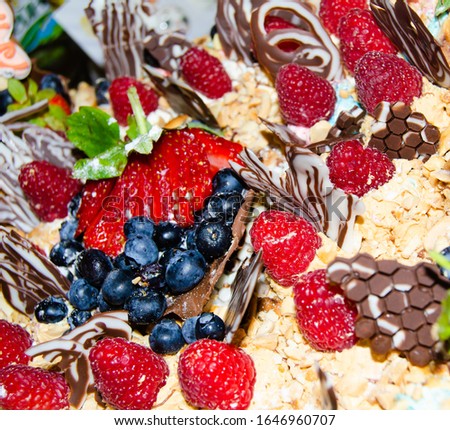 Fresh berries on the cake. close-up, background