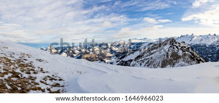 Pictures of snow-capped mountains with a view of the lake and mountain front