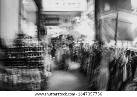 abstract photos on the market in black and white, blurry image
