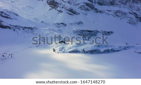 Snow covered mountains - a winter s day in the Alps - aerial view - aerial photography