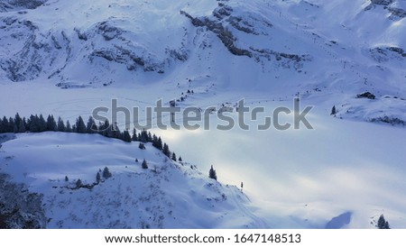 Wonderful snowy winter landscape in the Alps - aerial view - aerial photography