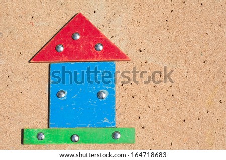Old houses on cork board. Concept photo of Real estate market bubble , booming, money,price, grid, home, rent, house, housing, industry and subprime mortgage crisis. No people. Copy space