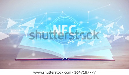Open book with NFC abbreviation, modern technology concept