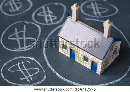 House bubble boom presentation on chalkboard. Concept photo of Real estate market bubble, housing market, subprime mortgage crisis Home loans, Mortgage loans background. No people. Copy Space