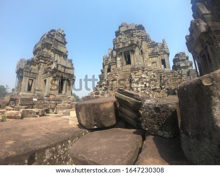 wide angle picture of ancient temple ruin towers of angkor wat renovating in cambodia